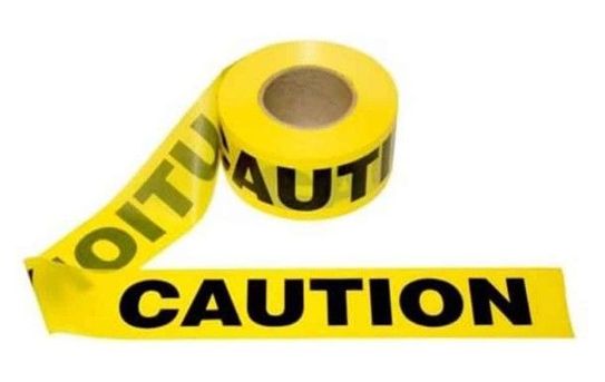 CUIDADO / CAUTION Yellow Barricade Tape