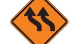 reverse-curve-left-(rus)-roll-up-sign-orange-traffic-sign-prod-front-part-ss-p-1