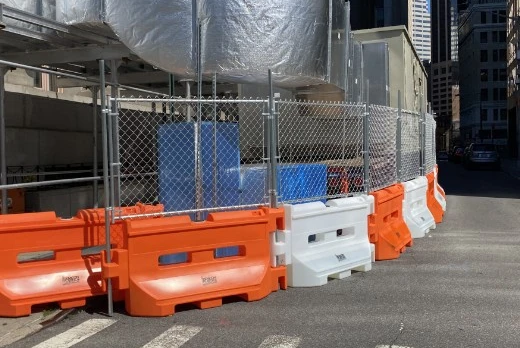 Custom fence screening on a temporary site